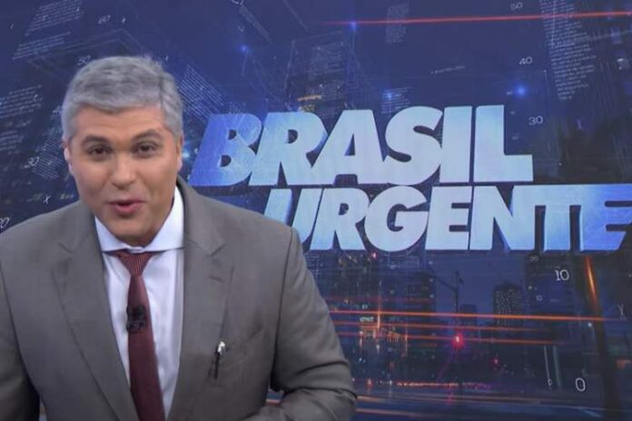 Joel Datena contando a história engraçada no Brasil Urgente (Reprodução: Band)